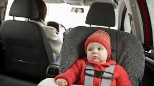 baby in carseat during winter